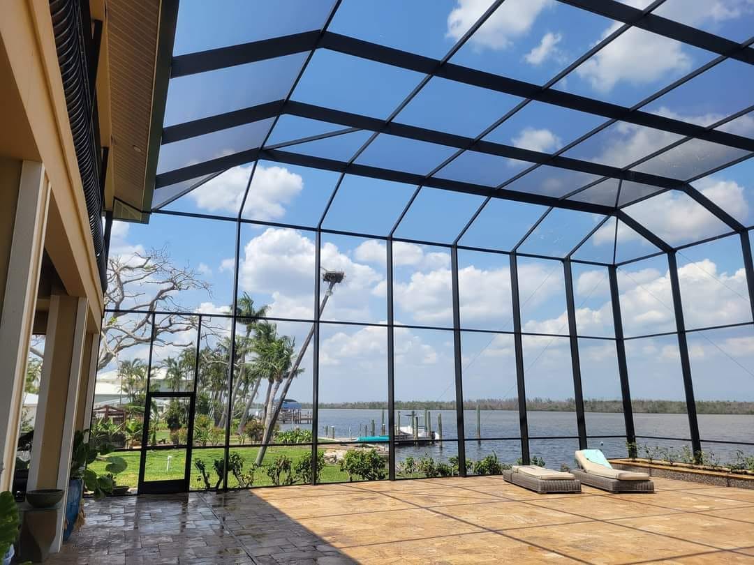 Waterfront screen enclosure with clear panoramic views